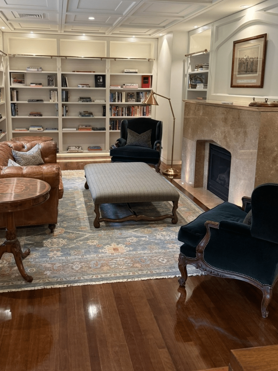 Library and sitting room with layered lighting